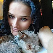 Bella Nicole is registered to the contest to win money with this photo: woman, dog, sleeping, pet, indoor, selfie, black_hair, curled_up, cozy, smiling, face, fur, nap, close_up, relaxed, cute, companion, resting, human, animal