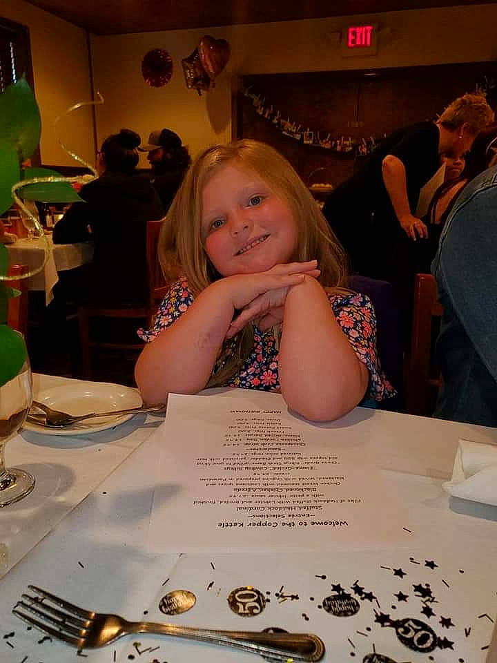 Preslee joined the competition — help win amazing prizes! child, dinner, ear, finger, fun, glasses, joy, meal, person, restaurant, table, tableware, under_exposed