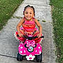 Journey joined the competition — help win amazing prizes! child, girl, smiling, braided_hair, beads, toy_car, minnie_mouse, pink, sidewalk, grass, outdoor, happy, play, cute, summer, clothing, patterned_outfit, wheels, daytime, person