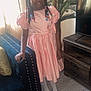 Aliyah is registered to the contest to win money with this photo: architecture, building, child, clothing, computerhardware, couch, dress, electronics, face, female, furniture, girl, hardware, indoors, livingroom, monitor, person, room, screen, tv