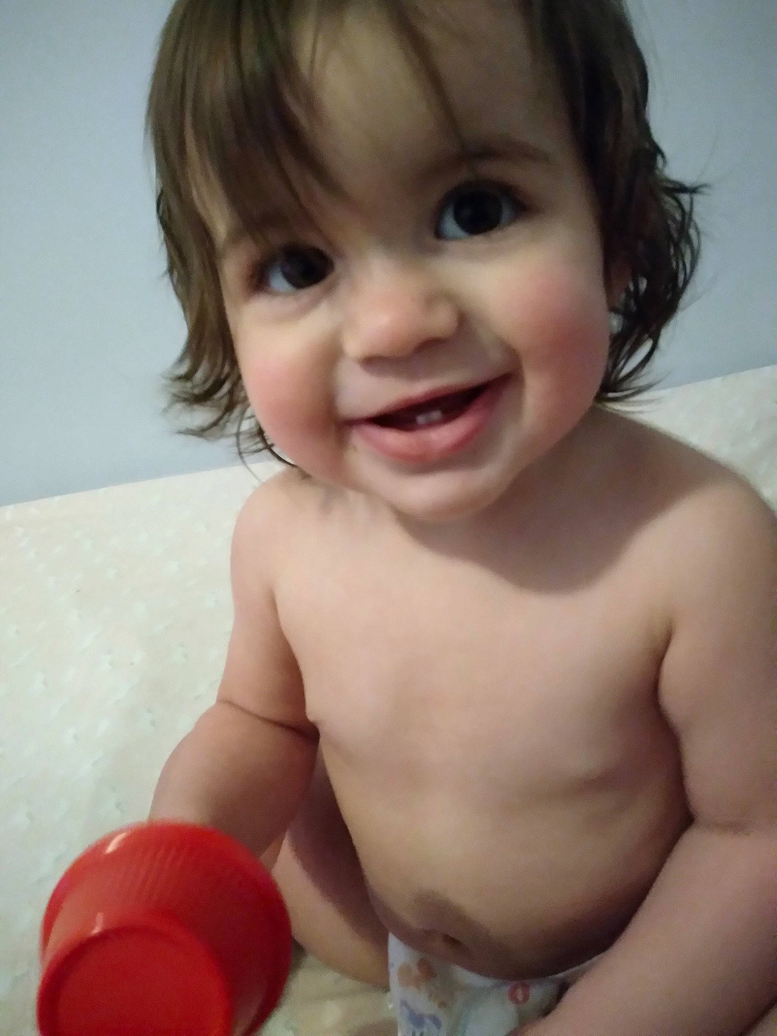 Amelia is registered to the contest to win money with this photo: arm, baby, cheek, chin, ear, eyebrow, eyelash, finger, gesture, happy, human_body, iris, joy, lip, mouth, muscle, neck, nose, organ, person