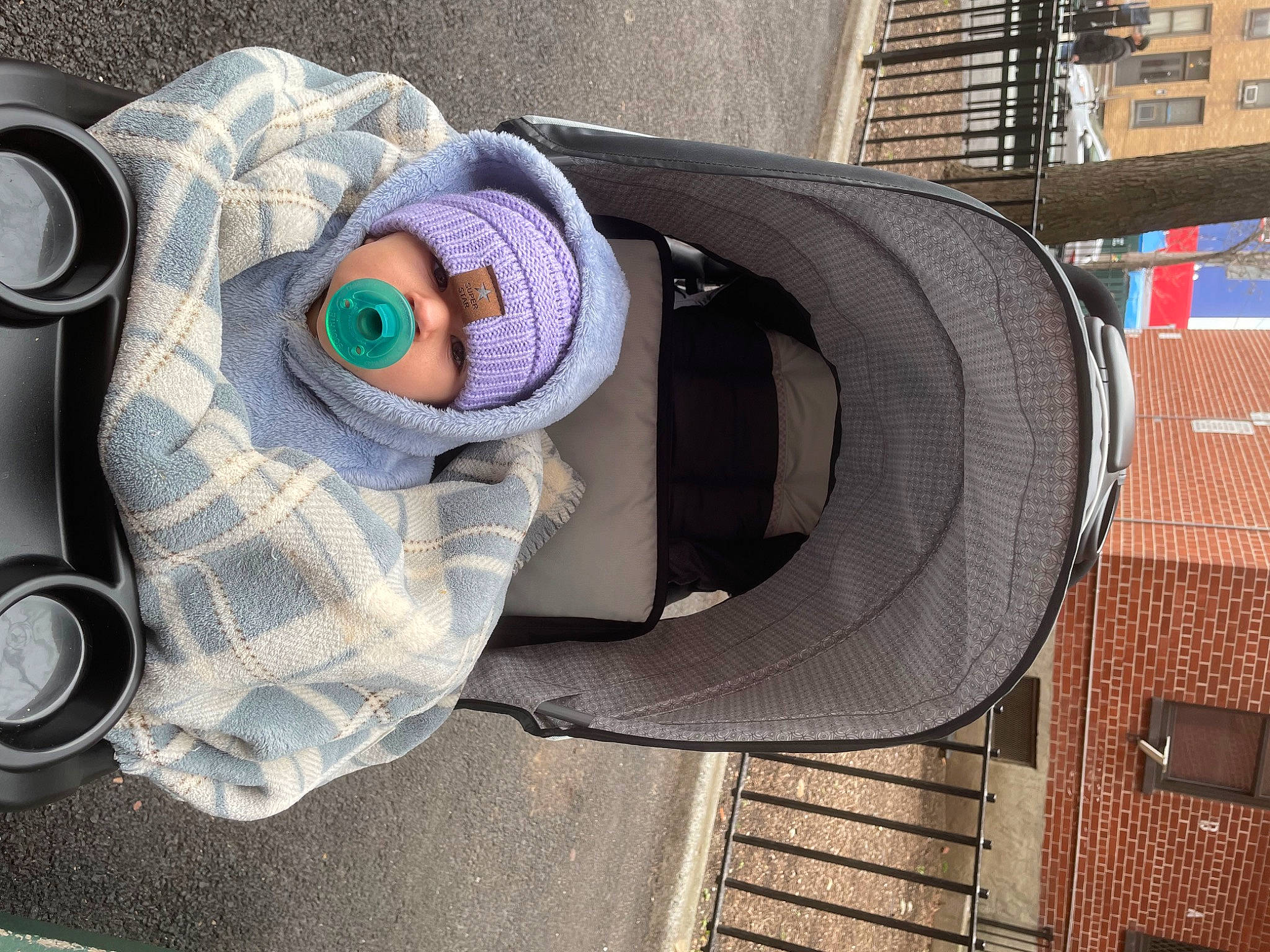 Zakiyah is registered to the contest to win money with this photo: art, audio_equipment, auto_part, automotive_design, automotive_exterior, automotive_tire, automotive_wheel_system, baby_products, bag, circle, city, electric_blue, eyewear, fashion_accessory, goggles, grey, hat, headwear, pattern, person