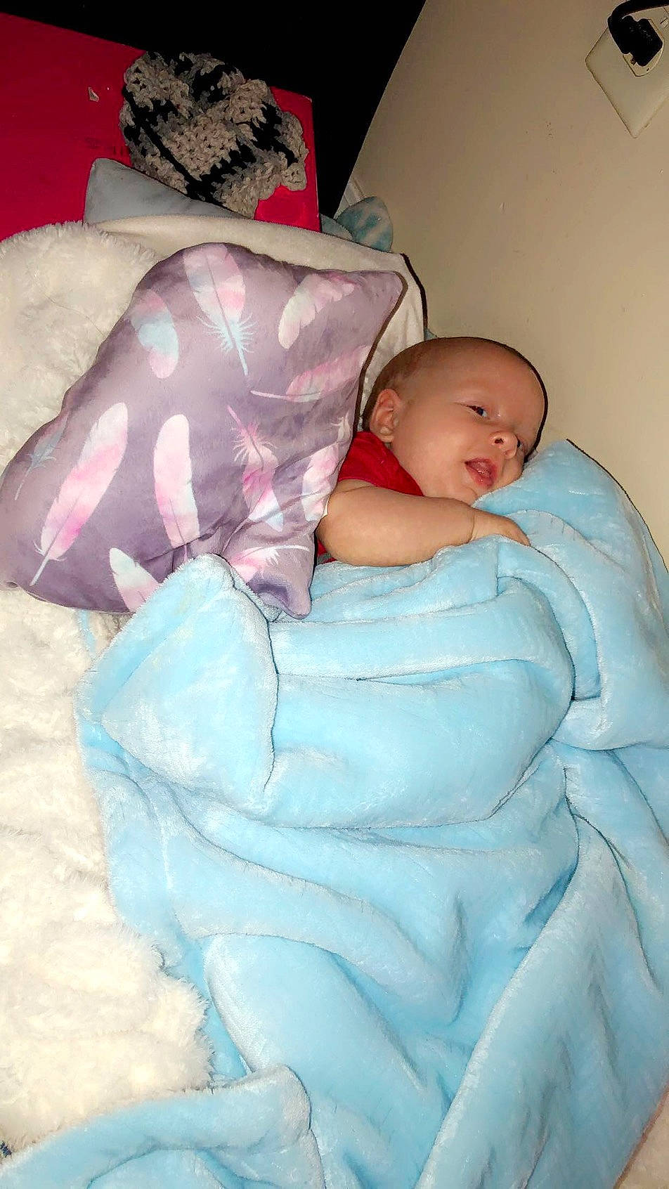 Travis is registered to the contest to win money with this photo: abdomen, baby, baby_products, baby_sleeping, baby_toddler_clothing, bedding, bedtime, cheek, chest, child, comfort, linens, nap, person, pink, product, room, sleep, textile, thumb