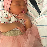 Kaedence joined the competition — help win amazing prizes! baby, sleeping, pink_tutu, headband, bow, blanket, infant, cute, peaceful, clothing, newborn, wrapped, soft, hand, face, portrait, adorable, resting, child, closeup