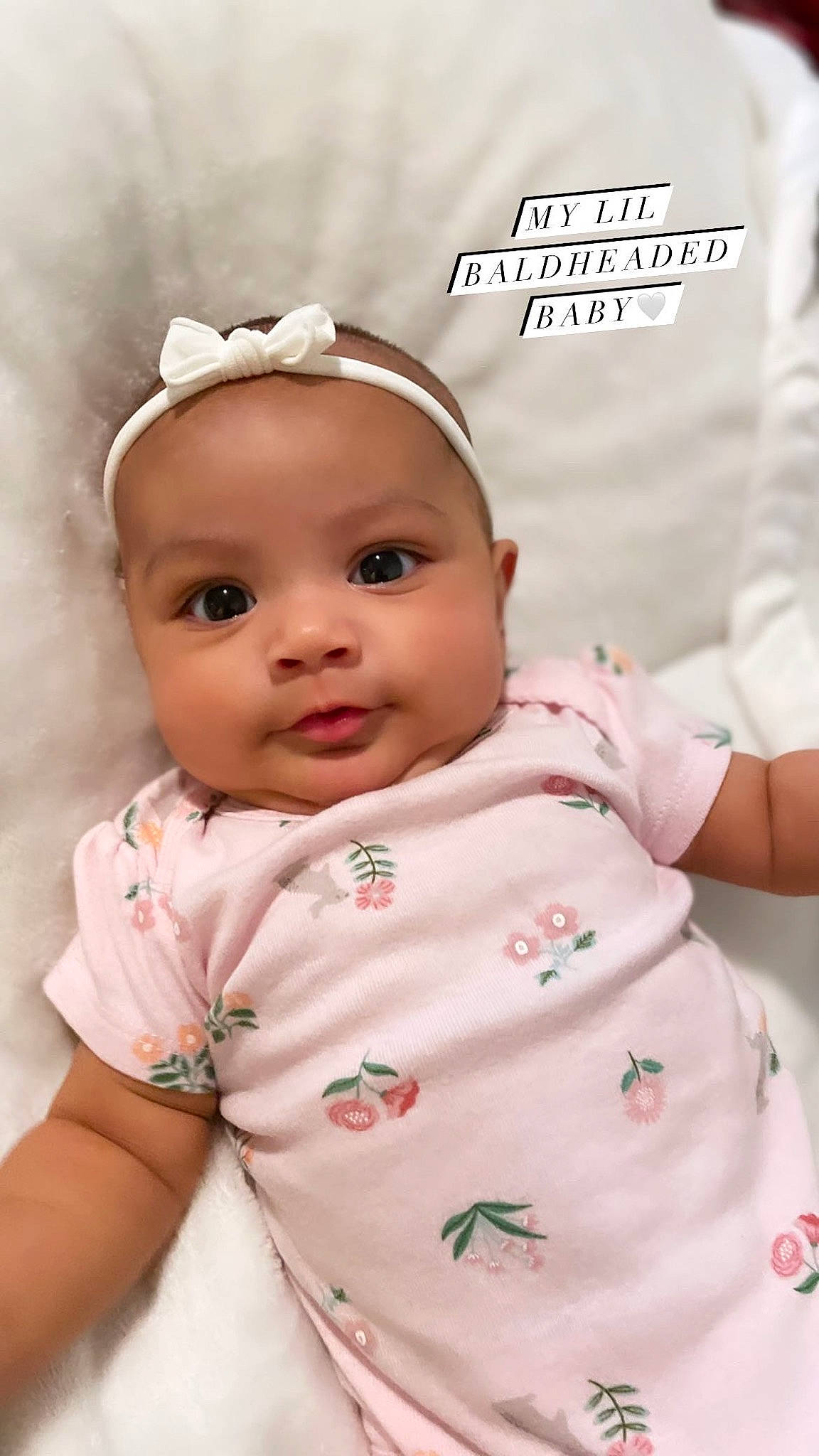 Esme is registered to the contest to win money with this photo: baby, baby_toddler_clothing, beauty, cheek, child, collar, comfort, eyebrow, eyelash, face, facial_expression, hairstyle, happy, headwear, lip, nose, person, pink, skin, sleeve