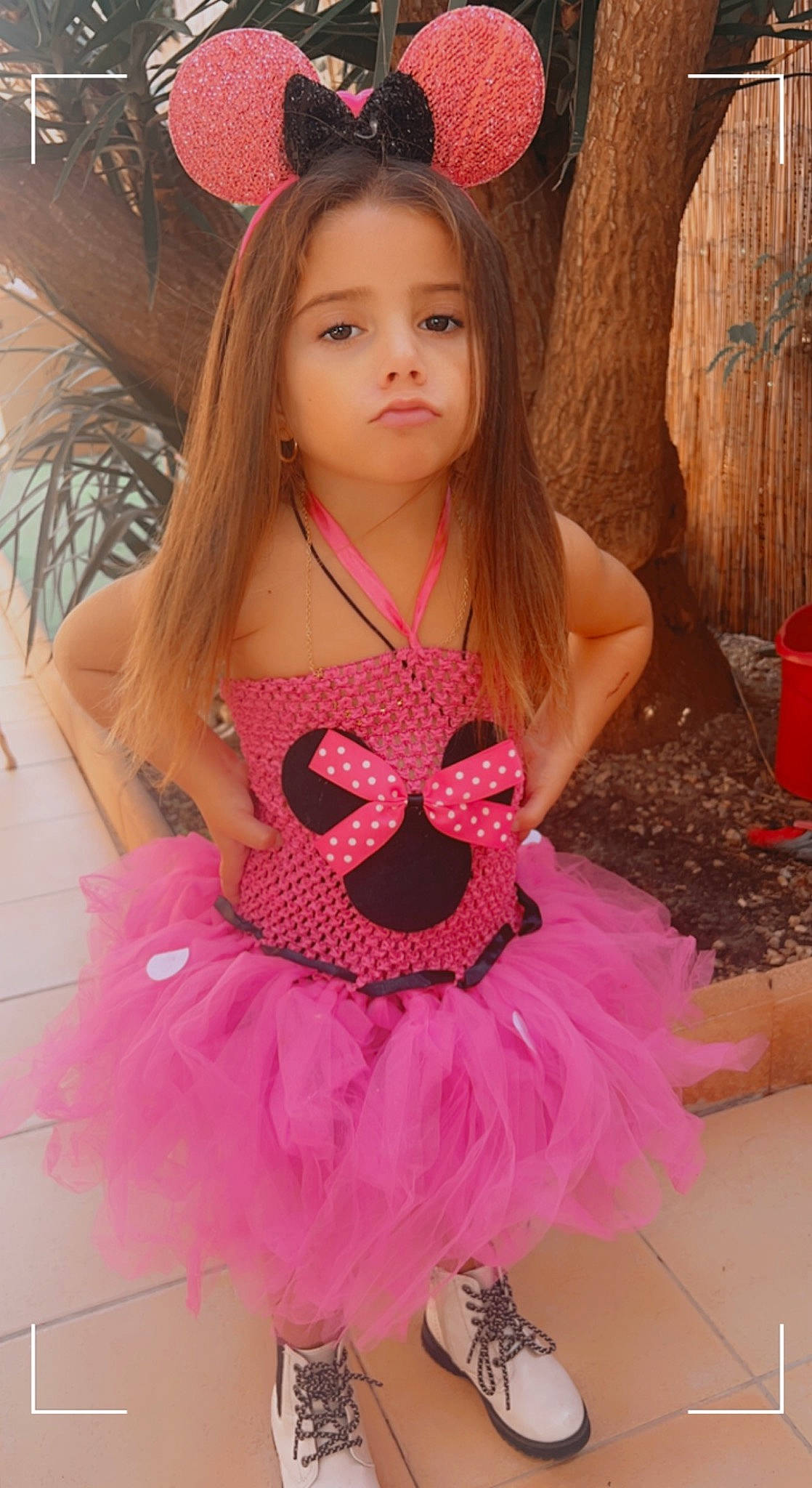 Kataleya participe au concours pour gagner de l'argent avec cette photo : baby_toddler_clothing, ballet_tutu, day_dress, dress, event, facial_expression, fashion_design, formal_wear, hair_accessory, happy, headgear, headpiece, iris, long_hair, magenta, outerwear, person, pink, ruffle, skin