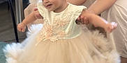 Darya a rejoint le concours — aidez-le/la à gagner de superbes lots ! adult_hand, baby, carpet, child, cute, dancing, dress, floor, fluffy_skirt, foot, happy, headband, indoor, lace, motion_blur, person, smiling, supporting_hand, toddler, white_clothing