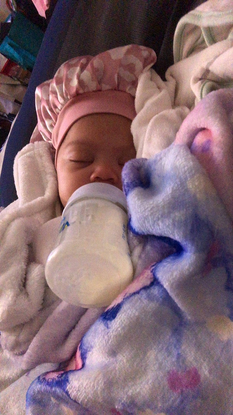 Xylah joined the competition — help win amazing prizes! baby_sleeping, cheek, chin, comfort, eye, facial_expression, finger, forehead, hand, head, headgear, human_body, lip, mouth, nose, person, pink, purple, skin, textile