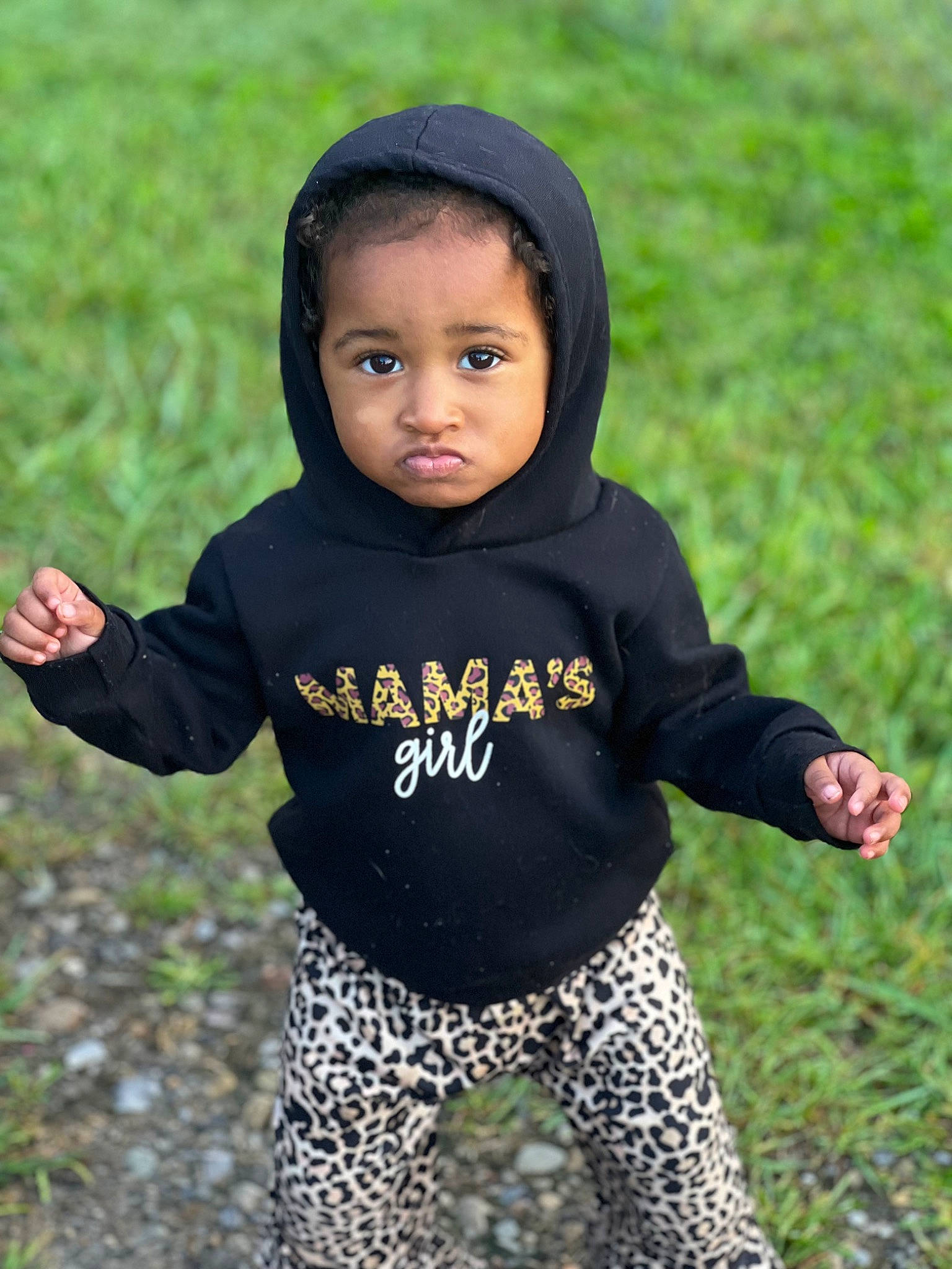 Ameri joined the competition — help win amazing prizes! baby, baby_toddler_clothing, child, face, facial_expression, grass, happy, long_sleeved_t_shirt, mammal, outerwear, pattern, people_in_nature, person, plant, sitting, sleeve, soil, t_shirt, toddler, tree