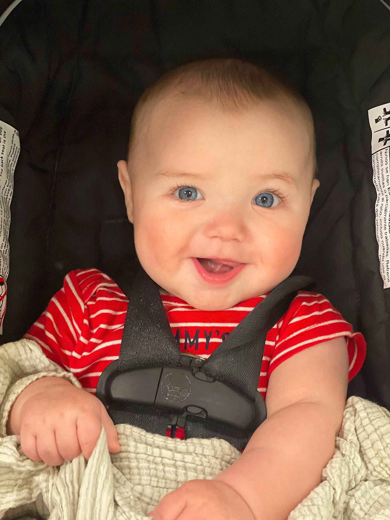 Connor is registered to the contest to win money with this photo: arm, baby_toddler_clothing, cheek, chin, comfort, eye, finger, flash_photography, glasses, hand, happy, iris, joy, lip, mouth, nose, person, product, skin, sleeve