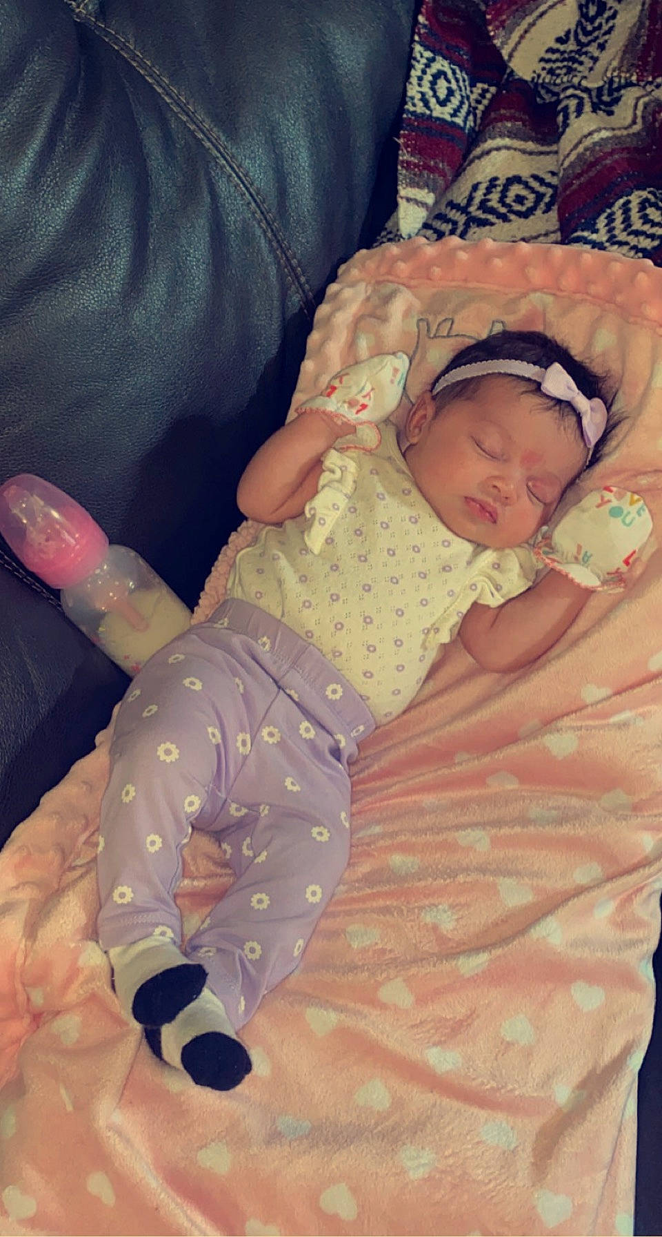 Riyah is registered to the contest to win money with this photo: arm, baby, baby_sleeping, baby_toddler_clothing, cheek, child, comfort, eye, finger, hand, human_body, linens, mammal, mouth, person, pink, skin, sleeve, thumb, toddler