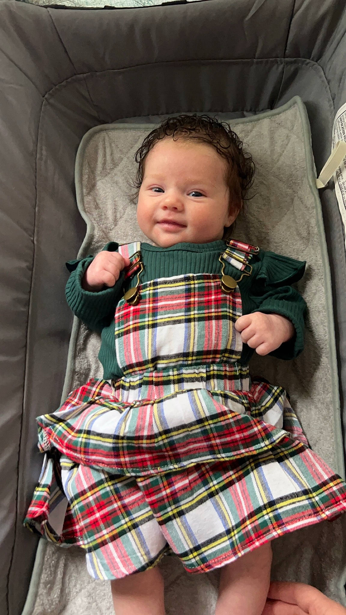 Matilda joined the competition — help win amazing prizes! baby, baby_products, baby_toddler_clothing, cheek, child, day_dress, design, dress, face, one_piece_garment, pattern, person, plaid, sitting, skin, sleeve, t_shirt, tartan, textile, toddler