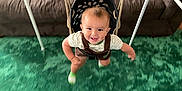 Donald Scudder Jr joined the competition — help win amazing prizes! toddler, child, swing, indoor, carpet, couch, smiling, happy, clothing, person, furniture, baby, play, toy, home, room, green, brown, seat, fun