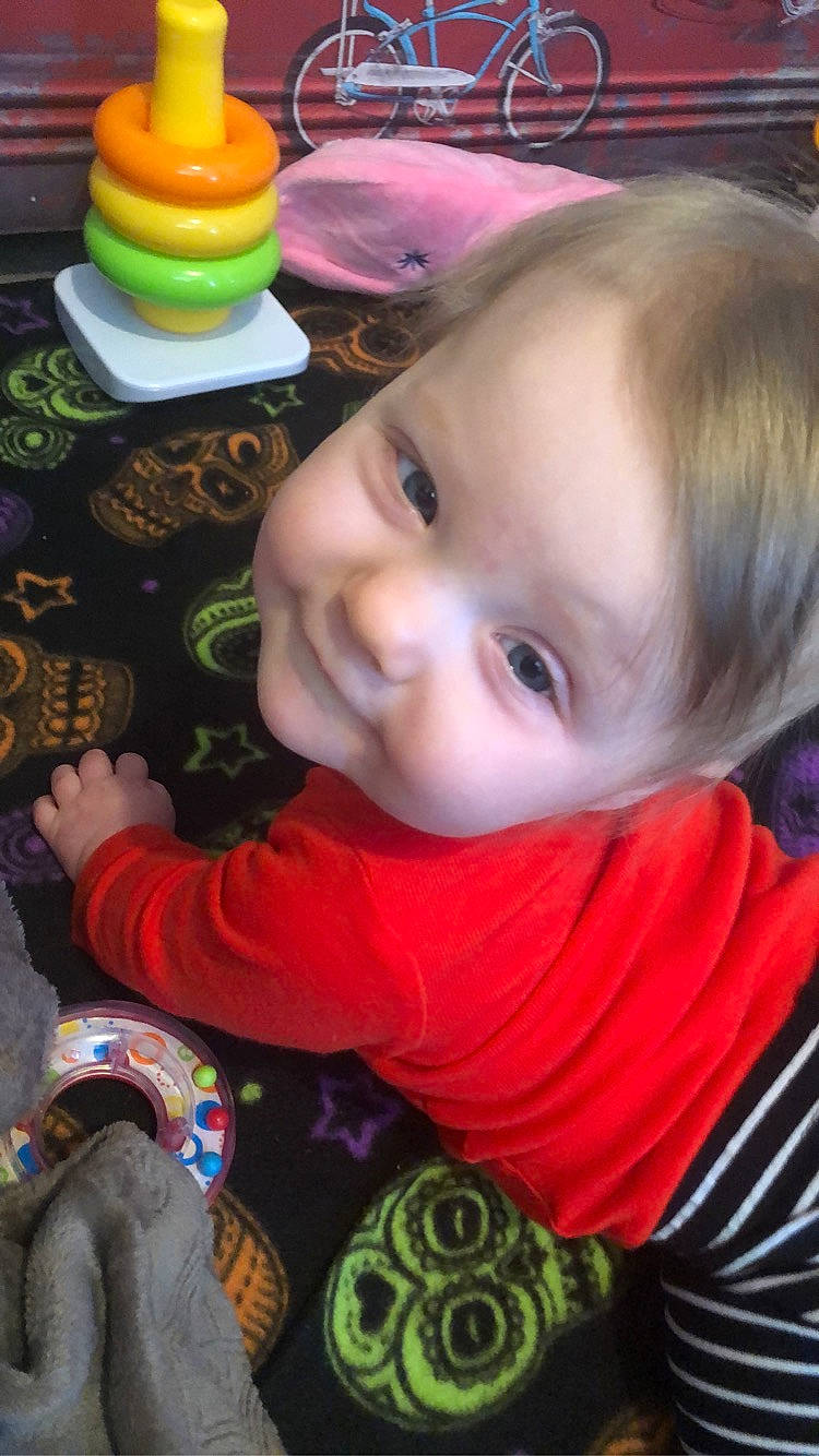 Shai is registered to the contest to win money with this photo: baby, baby_playing_with_toys, baby_products, baby_toddler_clothing, baby_toys, cheek, child, eye, joy, person, plastic, sock, toddler