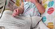 Aizley is registered to the contest to win money with this photo: baby, baby_seat, blanket, bouncer, child, colorful, face, finger, hand, happy, headband, infant, outdoor, patterned_fabric, pink_bow, portrait, safe, sitting, smiling, wooden_deck