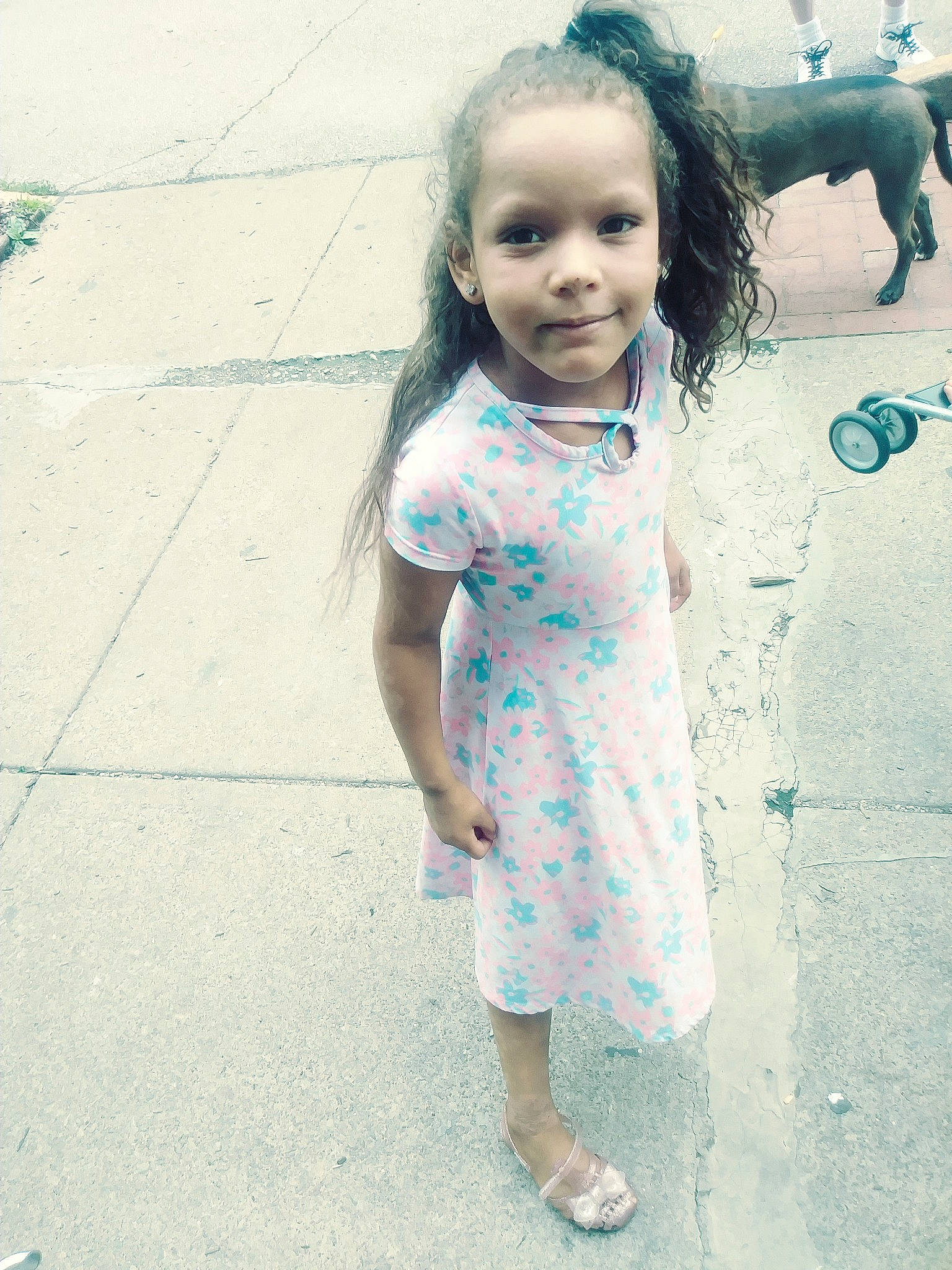 Payton is registered to the contest to win money with this photo: baby, blue, child, dress, eye, face, fun, happy, head, lip, people, person, photography, skin, smile, snapshot, standing, summer, toddler, turquoise