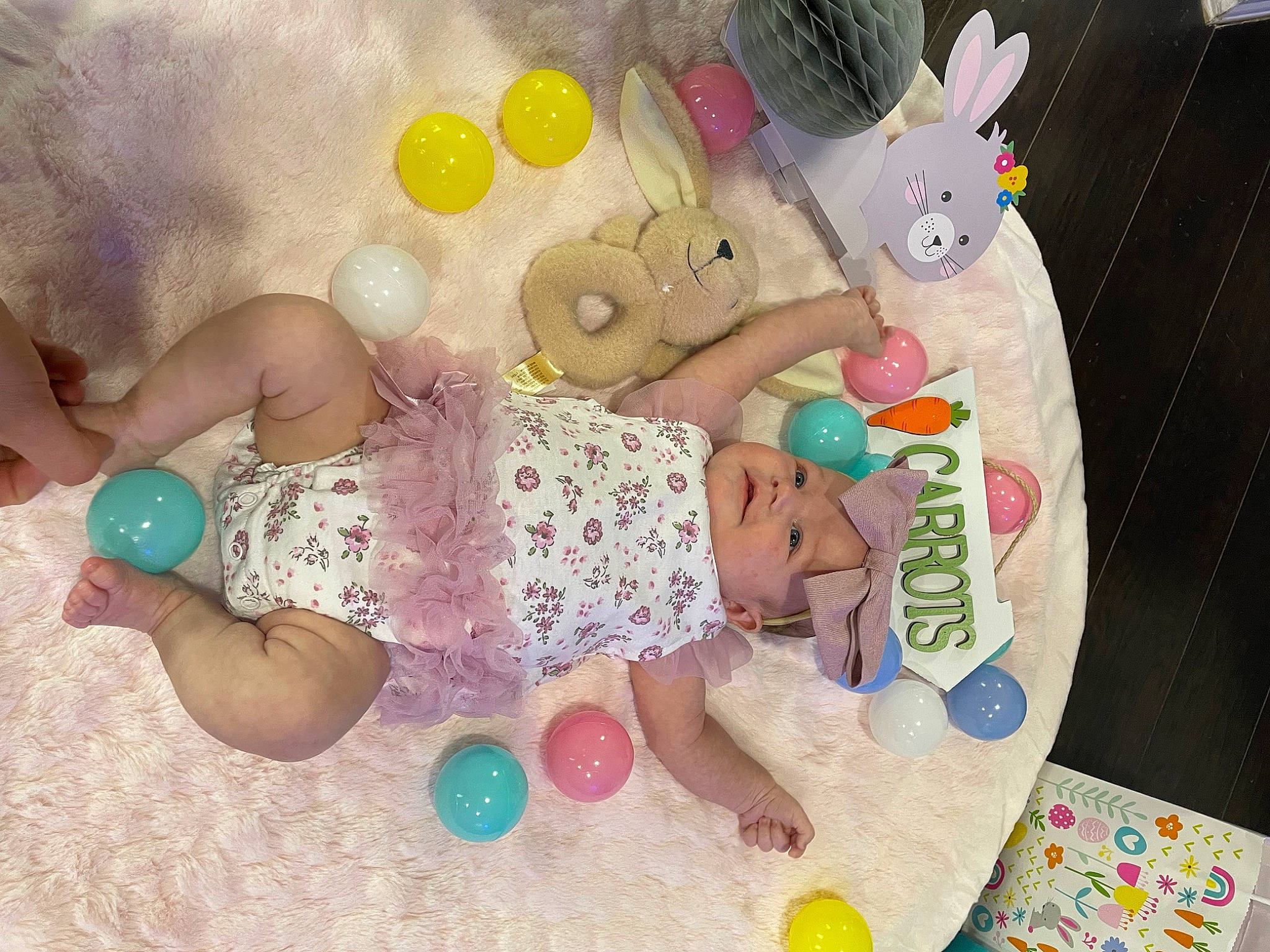 Charlee is registered to the contest to win money with this photo: baby_toddler_clothing, child, headwear, nail, pattern, person, pink, plastic, play, stuffed_toy, sweetness, textile, toddler, toy