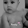 baby, black_and_white, child, chubby, curly_hair, cute, expression, face, indoors, infant, monochrome, naked_torso, pink_butterfly, portrait, sitting, skin, soft_light, text_overlay, word_monday, young_child
