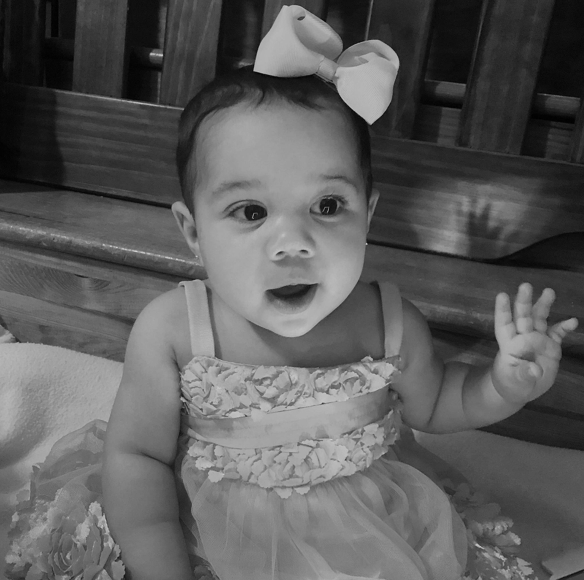 Madi is registered to the contest to win money with this photo: baby, beauty, black, black_and_white, child, eye, face, facial_expression, head, iris, monochrome, monochrome_photography, people, person, photograph, skin, smile, snapshot, standing, toddler