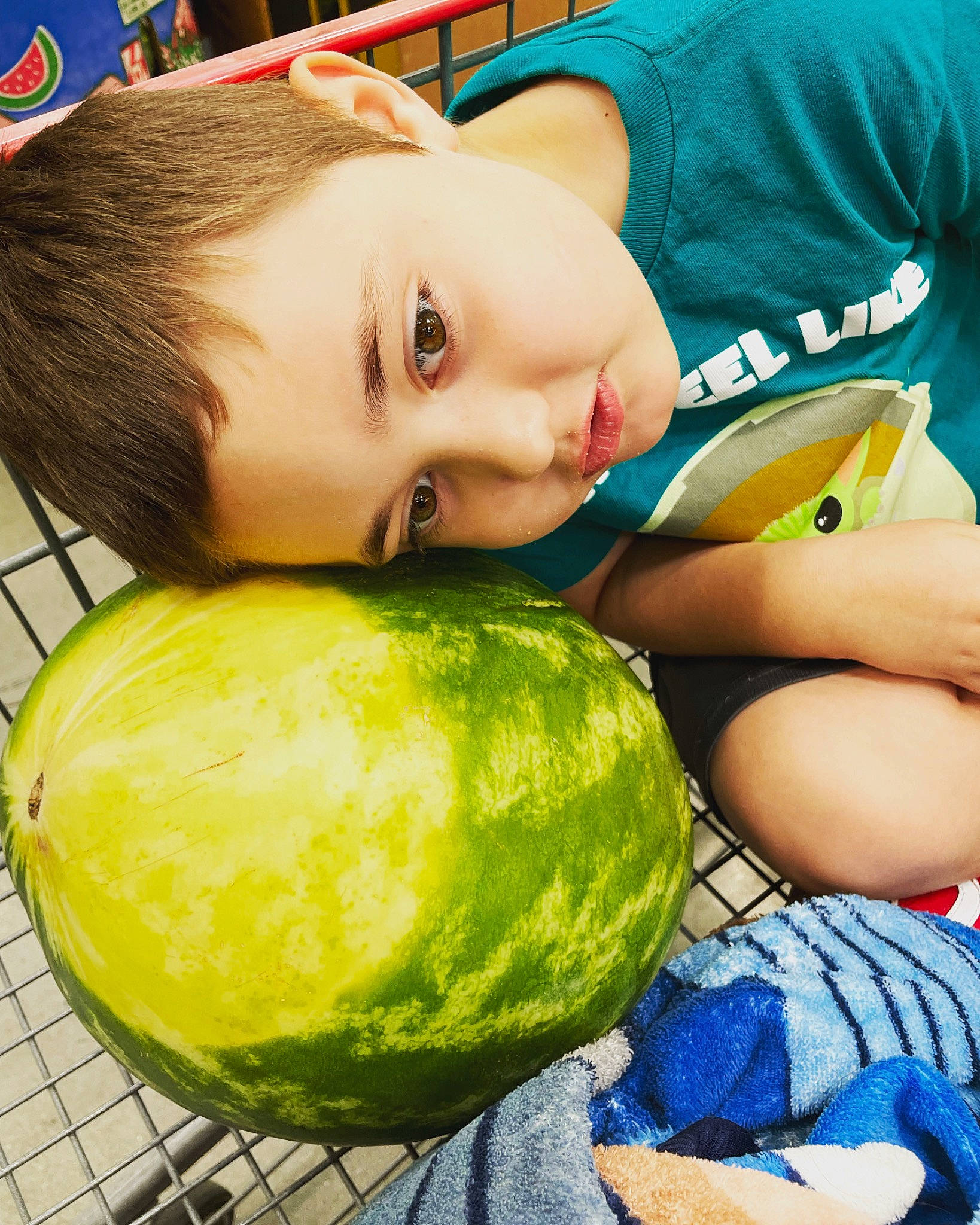 Corey is registered to the contest to win money with this photo: blue, child, citrullus, eyelash, food, fruit, fun, grass, green, happy, natural_foods, organ, person, photograph, plant, snapshot, squash, toddler, watermelon, whole_food