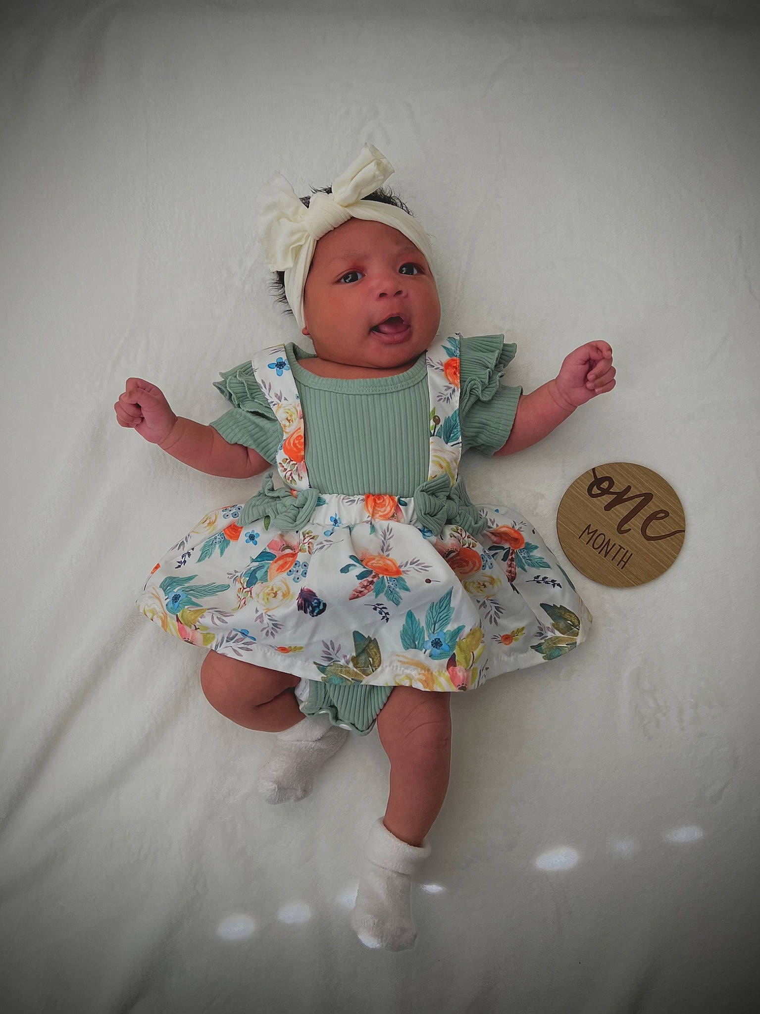 Aaliyah joined the competition — help win amazing prizes! arm, baby, baby_toddler_clothing, child, day_dress, dress, fashion_accessory, fashion_design, fun, happy, headwear, leg, magenta, pattern, peach, person, pink, room, sitting, sleeve