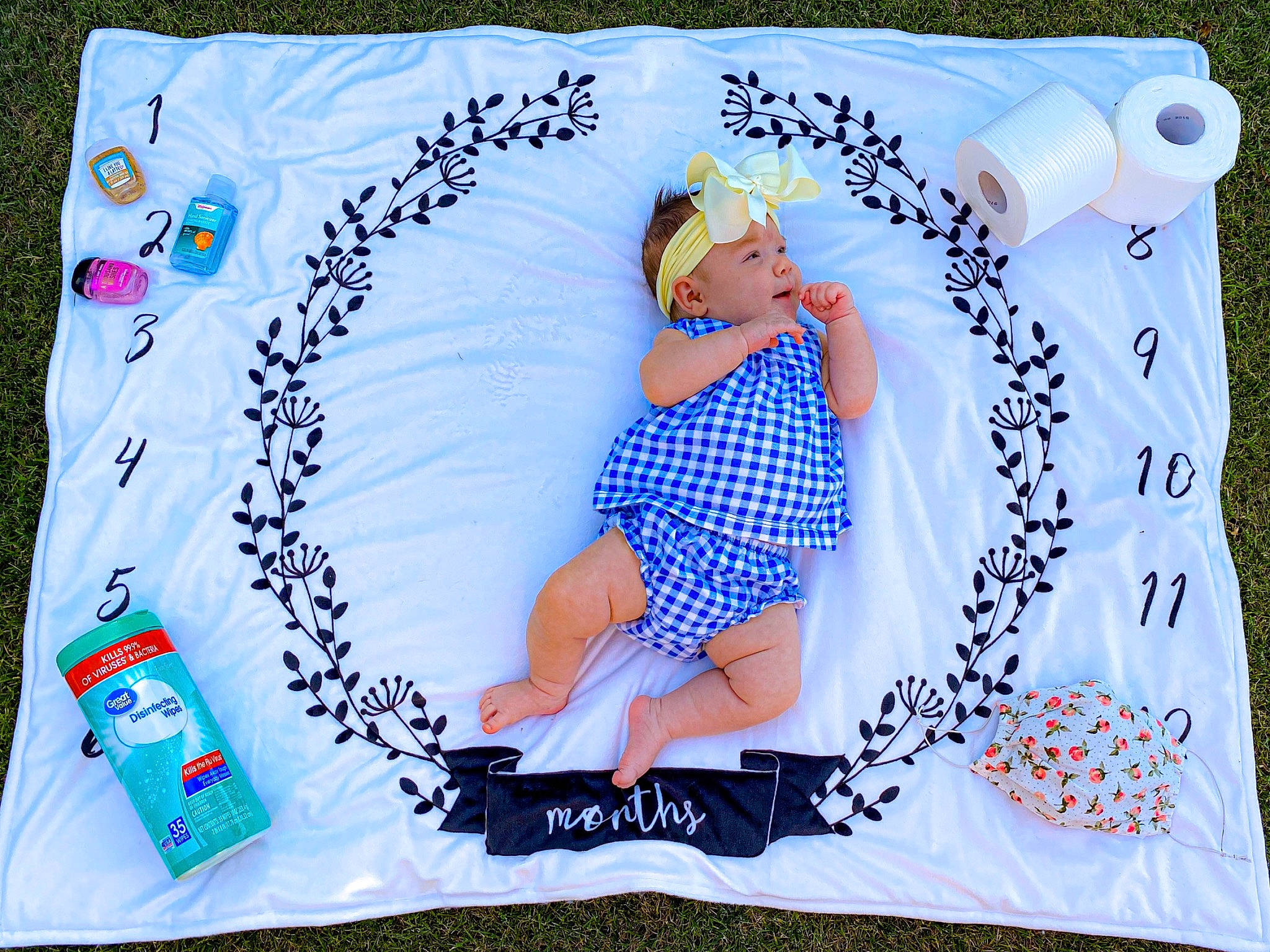 Joann is registered to the contest to win money with this photo: blanket, headwear, linens, pattern, person, product, textile, towel