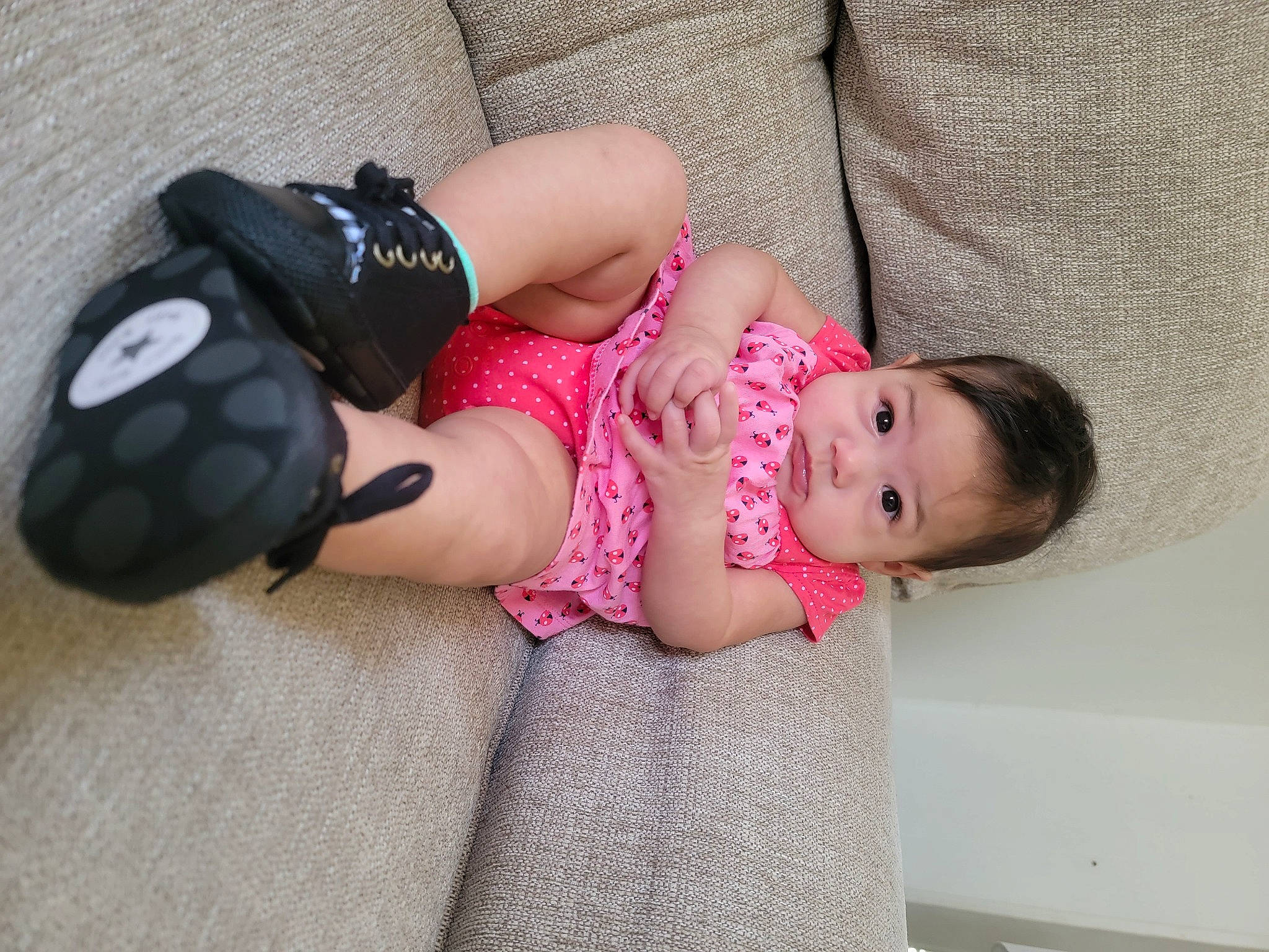 Luna is registered to the contest to win money with this photo: baby, baby_products, baby_toddler_clothing, child, comfort, design, fashion_accessory, foot, human_leg, leg, nail, pattern, person, pink, sitting, skin, sock, thigh, toddler, toy