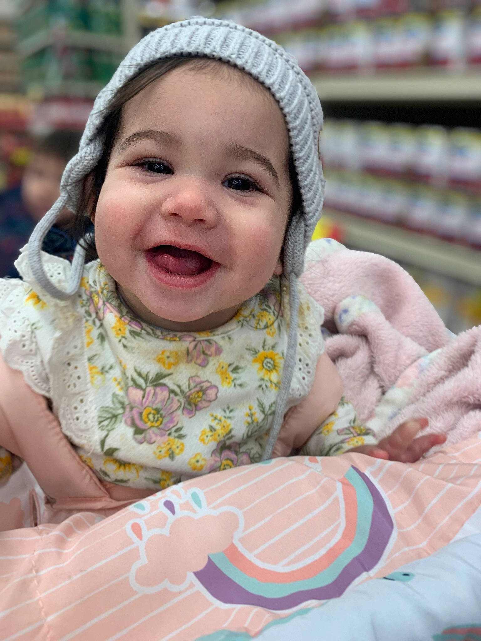 Anneliese is registered to the contest to win money with this photo: baby, baby_toddler_clothing, cheek, child, dress, event, eye, fun, grass, happy, head, leisure, mouth, pattern, people_in_nature, person, pink, skin, sleeve, smile