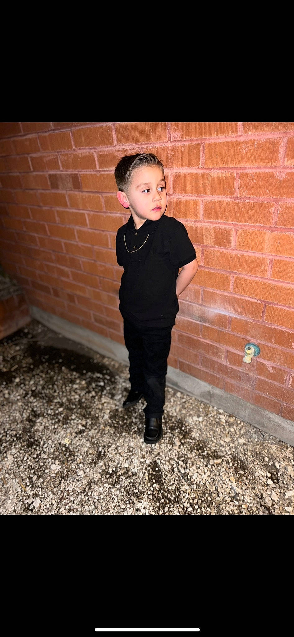 Maximo is registered to the contest to win money with this photo: asphalt, brick, brickwork, face, flash_photography, flooring, formal_wear, fun, hair, happy, head, human_body, leg, people_in_nature, person, sleeve, standing, t_shirt, tints_and_shades, toddler