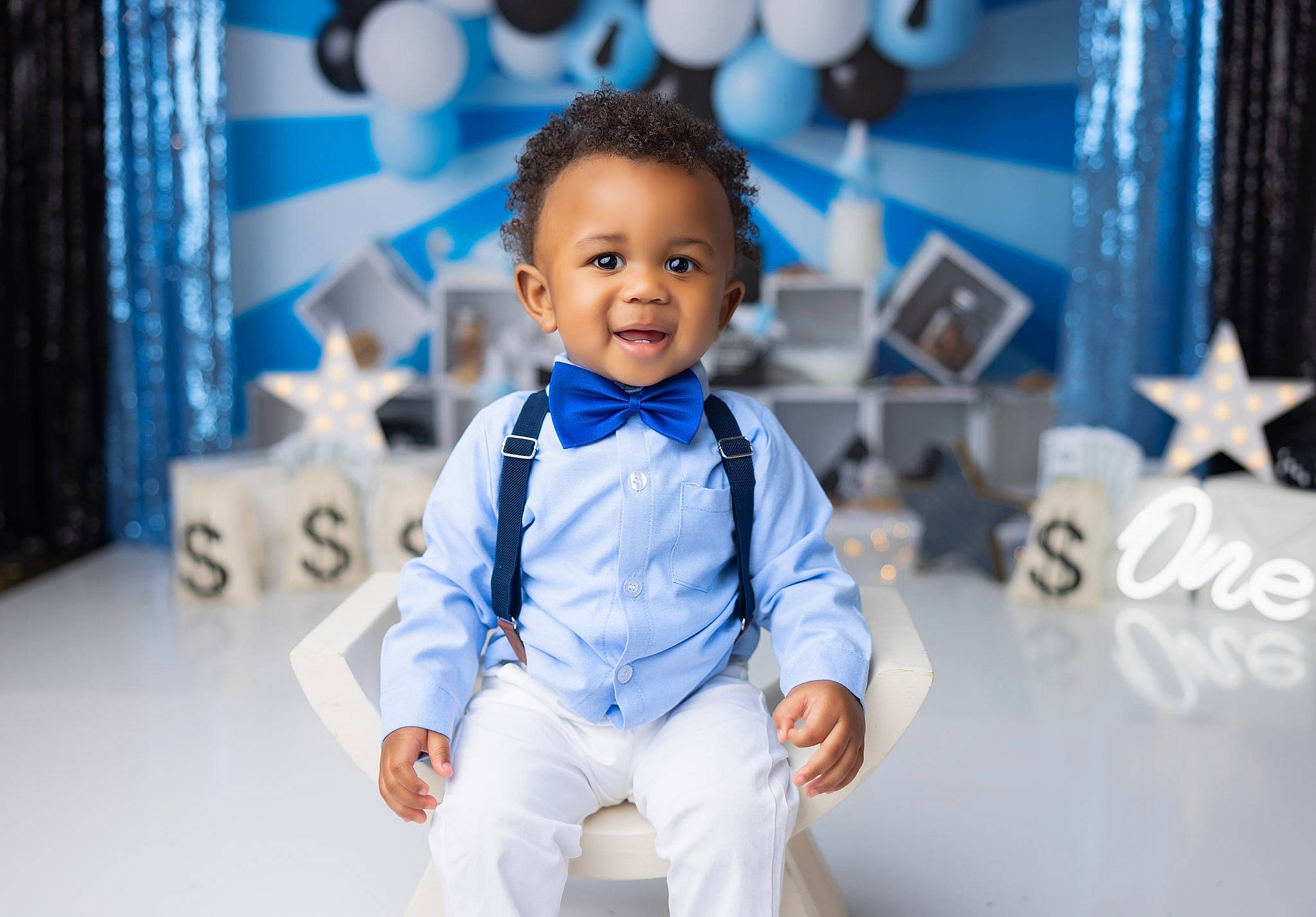 Brodie is registered to the contest to win money with this photo: azure, baby, baby_toddler_clothing, blue, child, curtain, electric_blue, event, eye, flash_photography, formal_wear, fun, happy, leisure, person, portrait_photography, purple, sitting, sleeve, smile