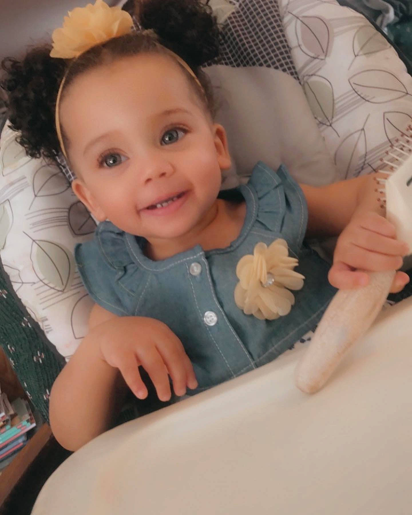 Zariyah is registered to the contest to win money with this photo: baby, baby_toddler_clothing, cheek, child, comfort, finger, flash_photography, fun, gesture, hand, happy, iris, joy, lip, mouth, person, skin, sleeve, smile, thigh