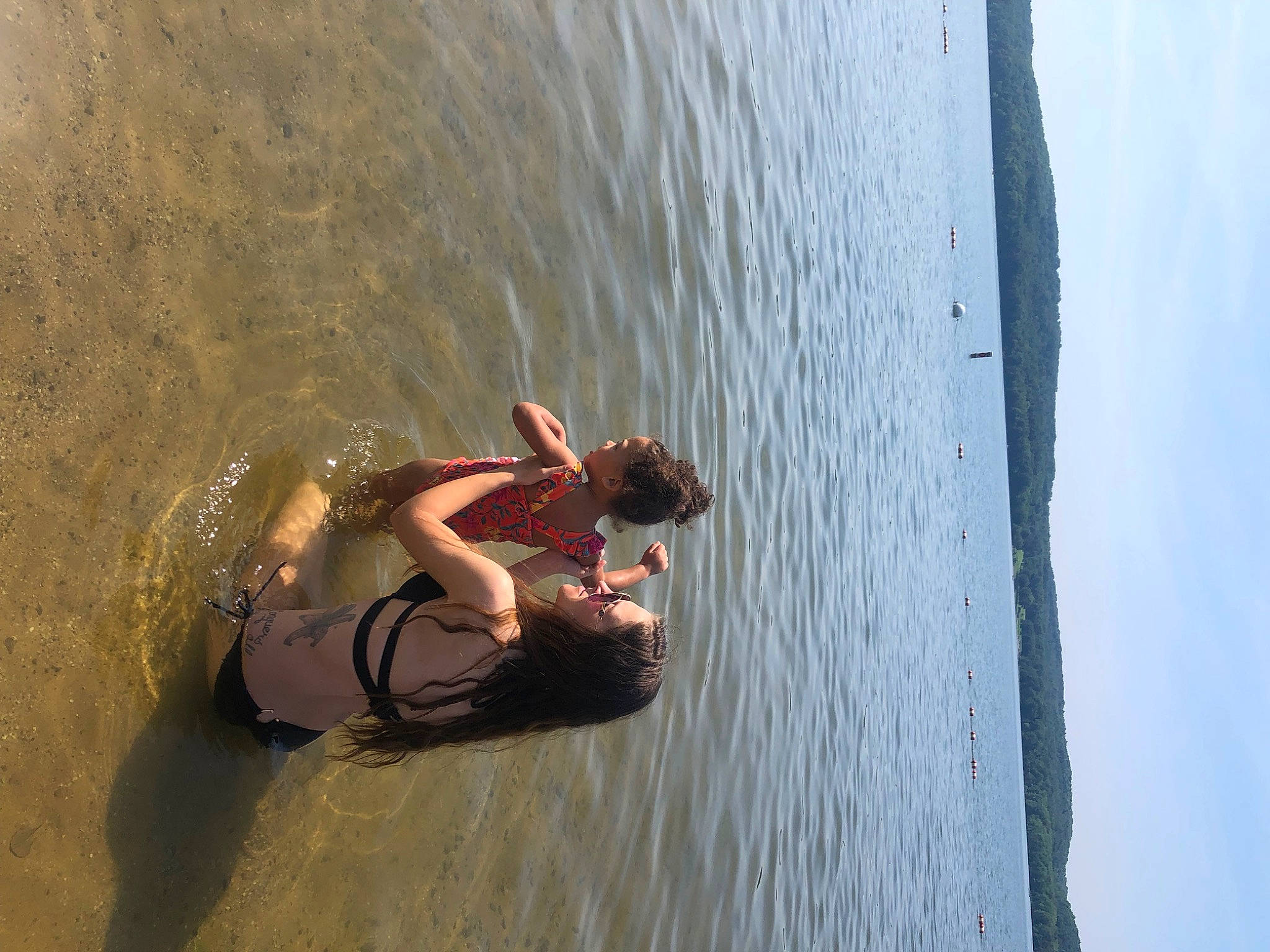 Zariyah joined the competition — help win amazing prizes! adventure, bathing, boats_and_boating_equipment_and_supplies, elbow, fun, happy, lake, leisure, outdoor_recreation, people_in_nature, person, personal_protective_equipment, recreation, reflection, shorts, sky, swimwear, tree, water, wind_wave