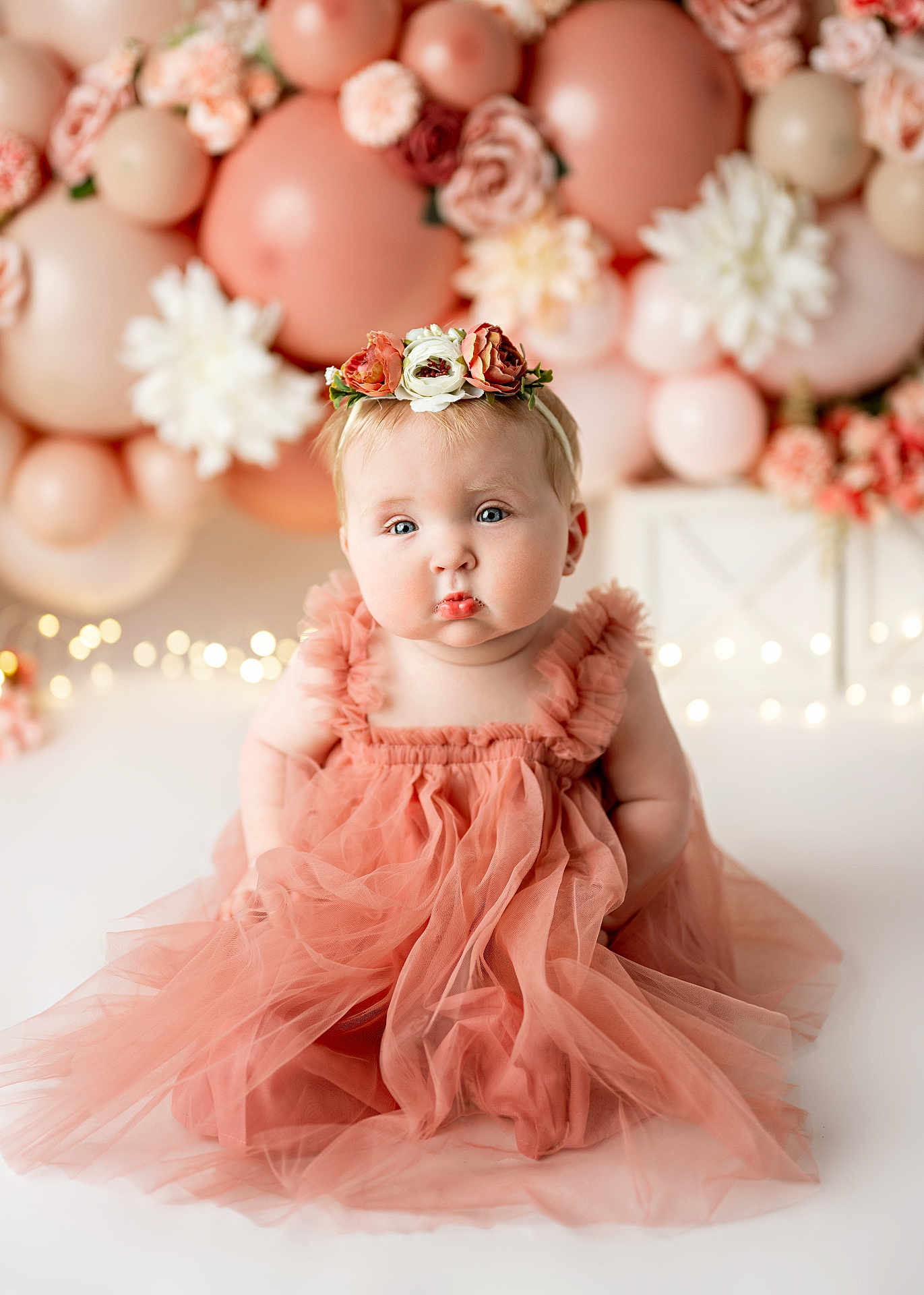 Anastasia joined the competition — help win amazing prizes! baby, child, dress, flower_crown, balloons, flowers, portrait, cute, pout, sitting, soft_lighting, studio, celebration, decor, pink, peach, infant, adorable, holiday, smile