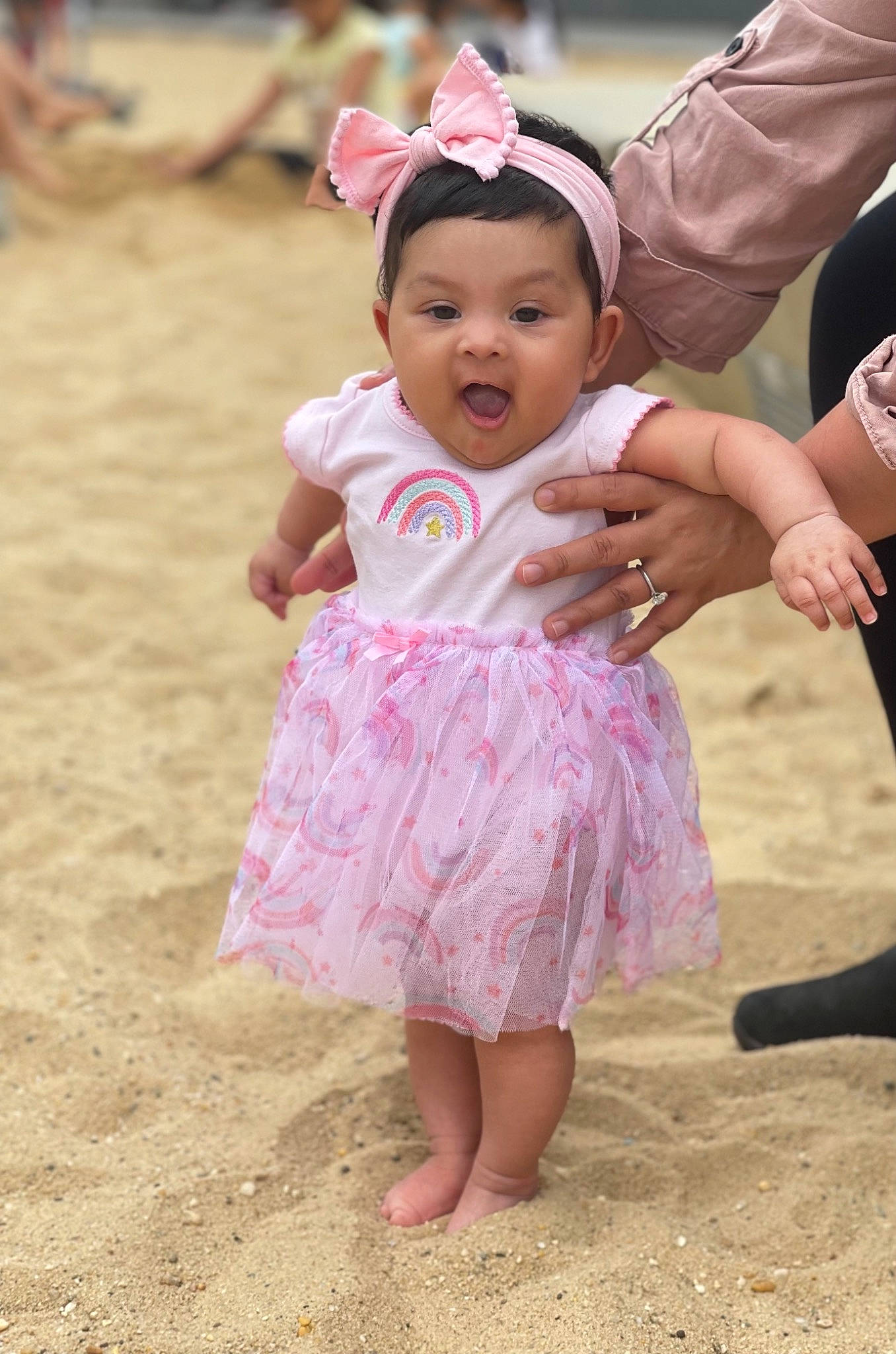Ameena joined the competition — help win amazing prizes! baby, beach, child, dress, event, face, fun, gesture, happy, hat, leisure, magenta, people_in_nature, people_on_beach, person, pink, play, recreation, soil, sun_hat