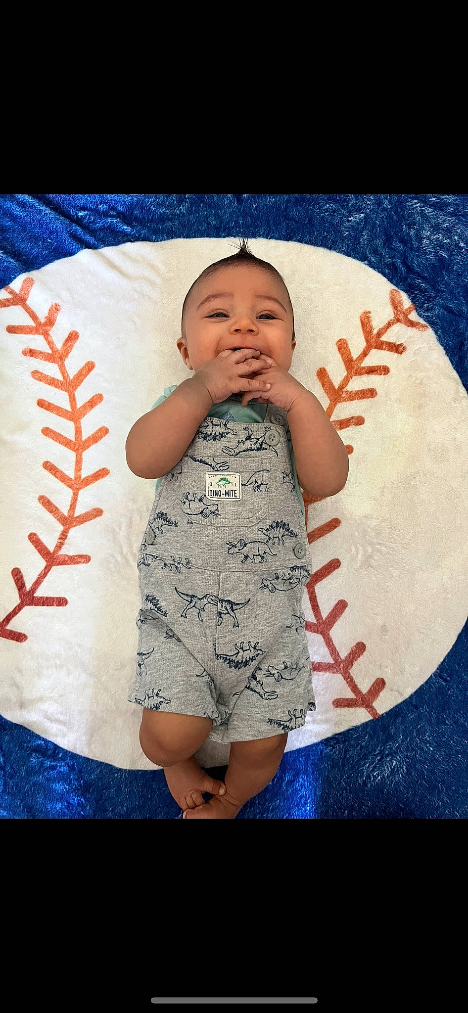 Abraham is registered to the contest to win money with this photo: art, baby, baby_products, baby_toddler_clothing, child, circle, flash_photography, fun, happy, human, linens, pattern, person, pink, portrait_photography, skin, sleeve, standing, t_shirt, textile