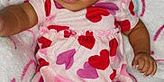 Ayah is registered to the contest to win money with this photo: accessories, baby, blanket, bodypart, clothing, dress, face, finger, furniture, hand, happy, hat, head, homedecor, newborn, person, photography, portrait, quilt, smile