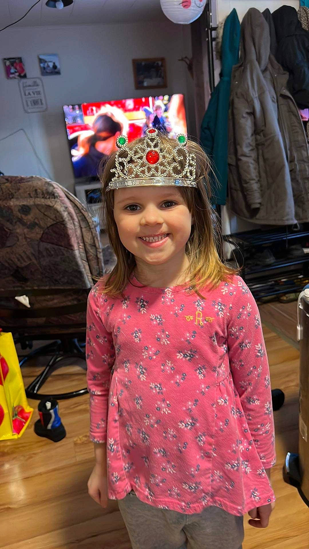 Nammie is registered to the contest to win money with this photo: baby_toddler_clothing, child, couch, event, fashion, fashion_accessory, fashion_design, fun, happy, hat, headpiece, headwear, joy, leisure, pattern, person, pink, room, sleeve, smile