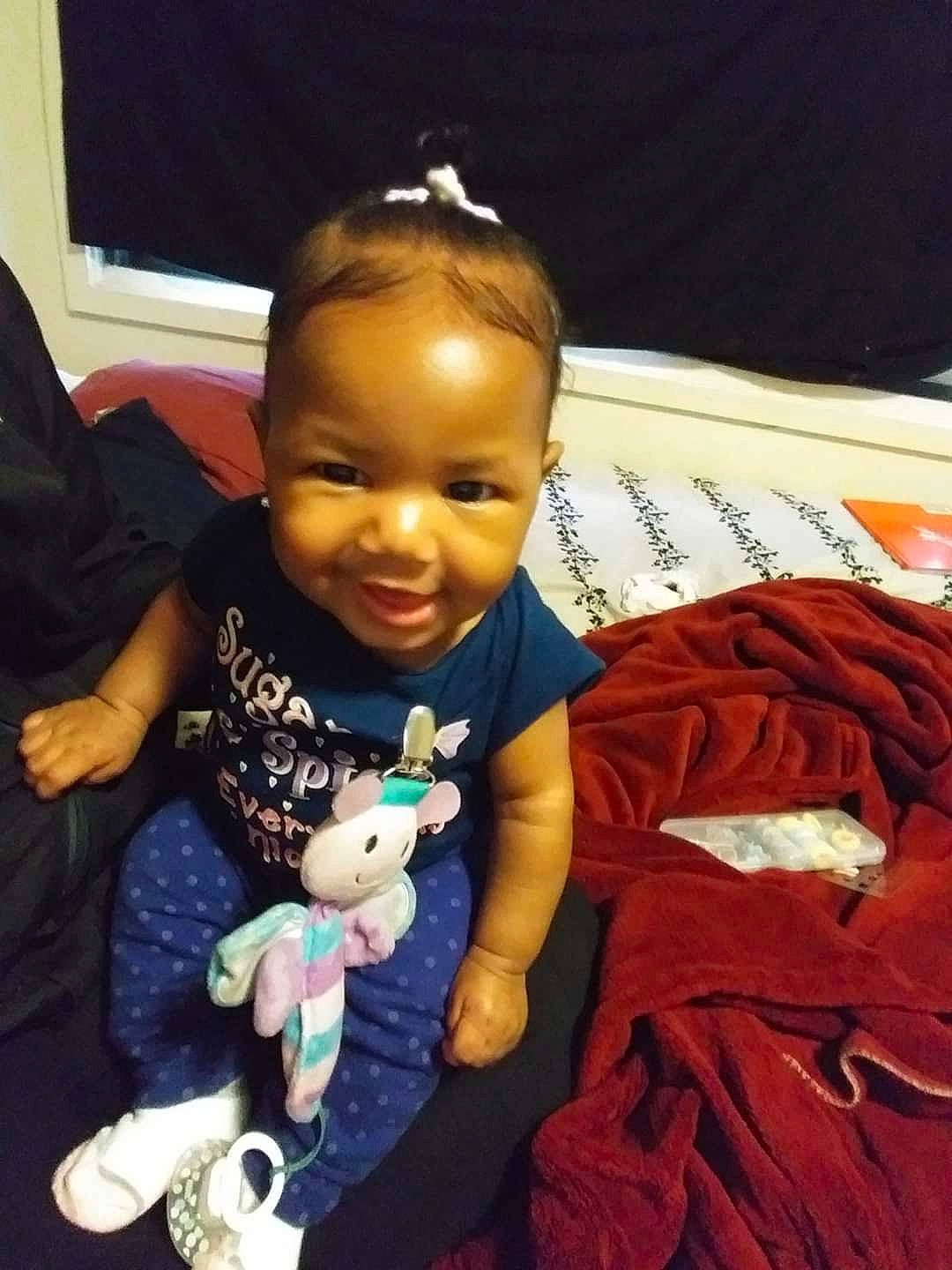 Legaci is registered to the contest to win money with this photo: arm, baby, cheek, child, cool, ear, forehead, hairstyle, head, person, play, sitting, smile, toddler, toy