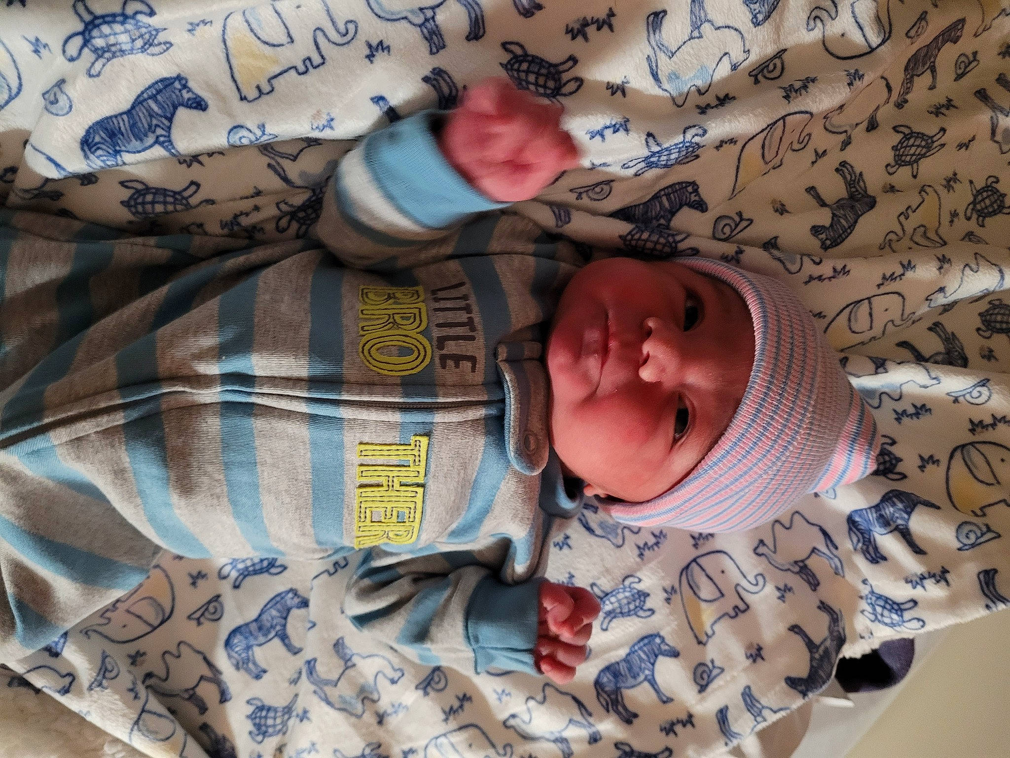 David is registered to the contest to win money with this photo: baby, baby_products, baby_safety, baby_sleeping, baby_toddler_clothing, bedding, bedtime, cheek, child, comfort, eye, finger, headwear, linens, nap, pattern, person, room, skin, sleeve