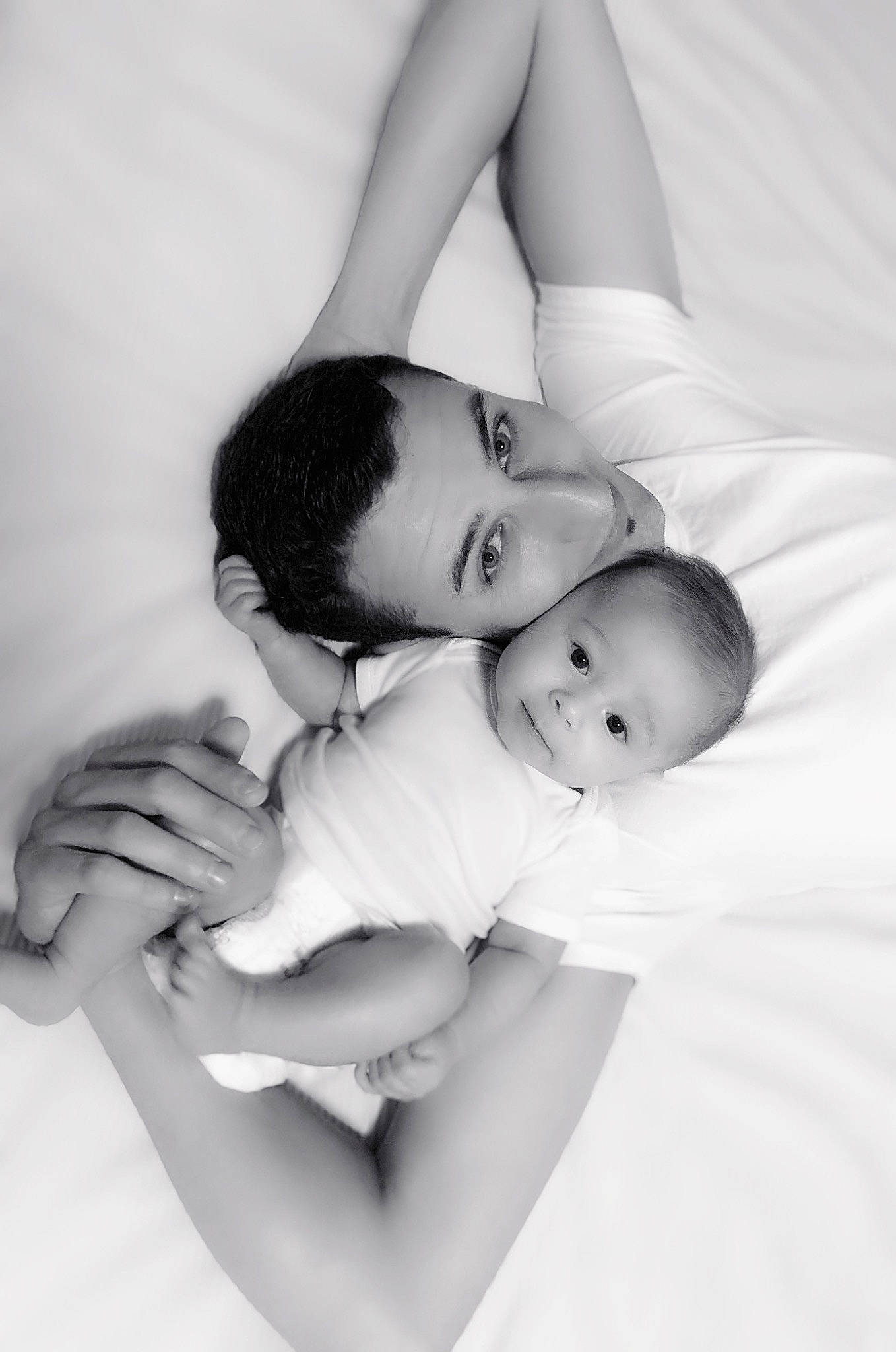 Hawk is registered to the contest to win money with this photo: baby, comfort, elbow, eye, facial_expression, flash_photography, gesture, hairstyle, happy, human_body, interaction, joint, leg, lip, mammal, neck, person, shoulder, skin, style