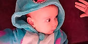 Hope-Rose joined the competition — help win amazing prizes! baby, child, hoodie, costume, blue, monster, hand, indoor, soft, plush, cute, face, expression, clothing, person, infant, warm, sleeve, pink, blanket