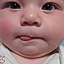 Leenna joined the competition — help win amazing prizes! baby, close_up, face, tongue, cheeks, eyes, skin, infant, cute, expression, clothing, white, pattern, portrait, young_child, human, soft_skin, adorable, front_view, head