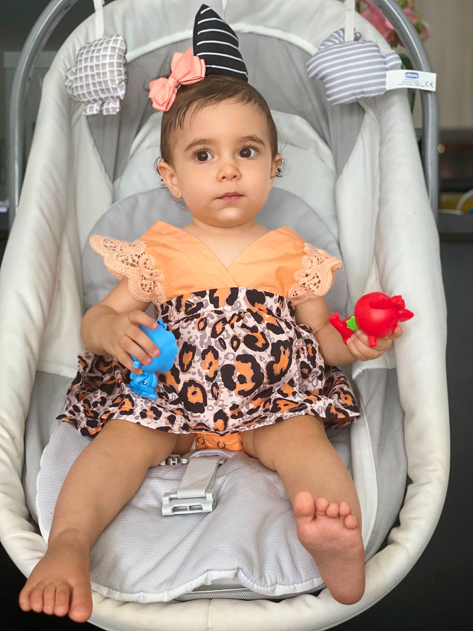 Ella May participe au concours pour gagner de l'argent avec cette photo : abdomen, baby, baby_carriage, baby_products, baby_toddler_clothing, bag, chair, child, comfort, event, fashion, hairstyle, human_leg, person, pink, product, shorts, sitting, textile, thigh