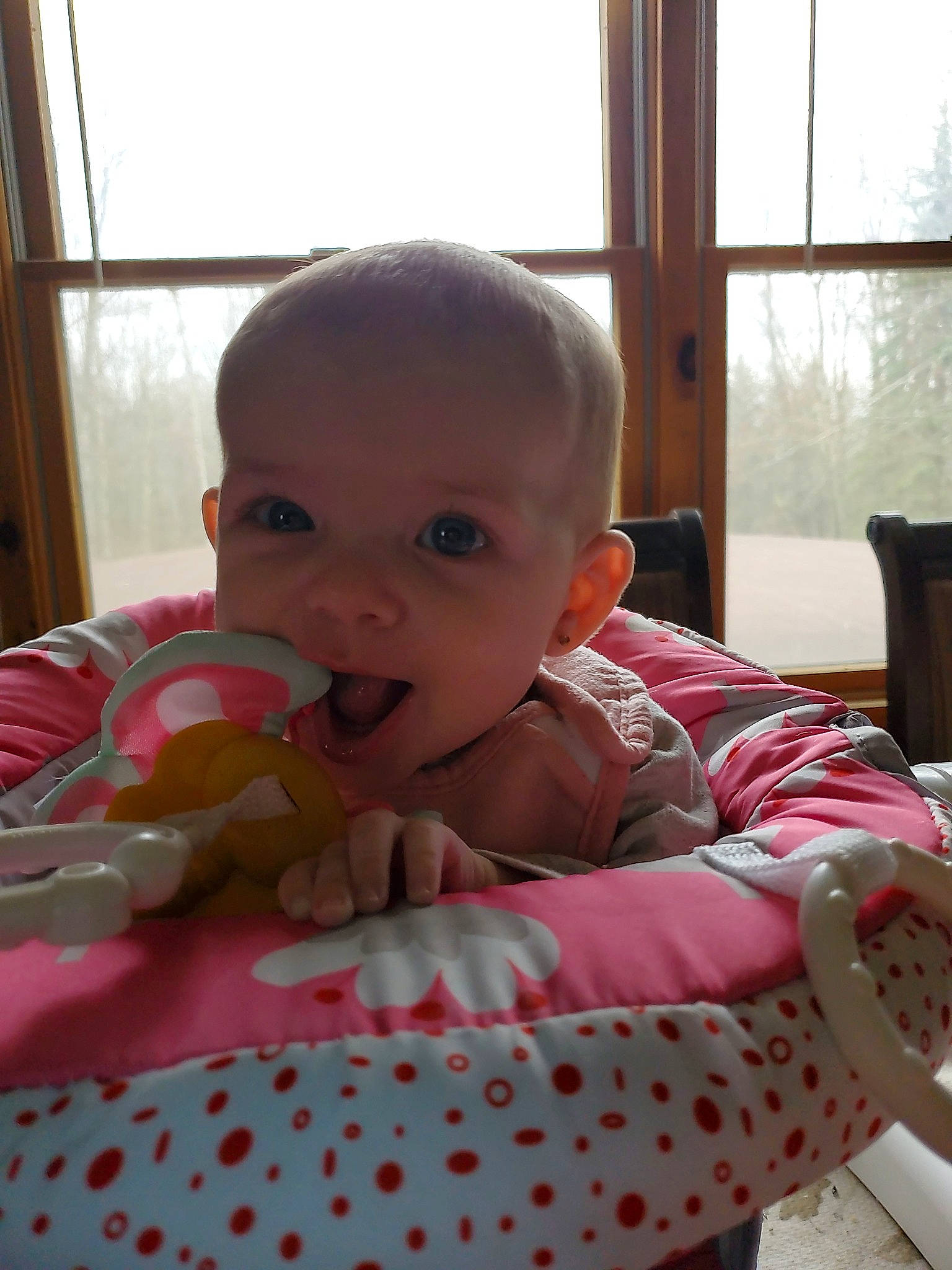 Katarina joined the competition — help win amazing prizes! baby, bed, cheek, child, eye, face, head, lip, mouth, person, pink, sitting, skin, toddler