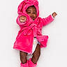 baby, infant, child, pink_robe, booties, diaper, cute, playful, portrait, studio, smile, fist, soft, fluffy, warm_clothing, isolated, white_background, fashion, happy, young