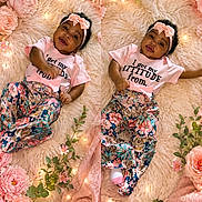 Legacy joined the competition — help win amazing prizes! baby, blanket, child, cute, decor, fairy_lights, fashion, floral_pants, flowers, happy, headband, indoors, infant, lying_down, person, pink, portrait, smiling, soft_rug, toddler
