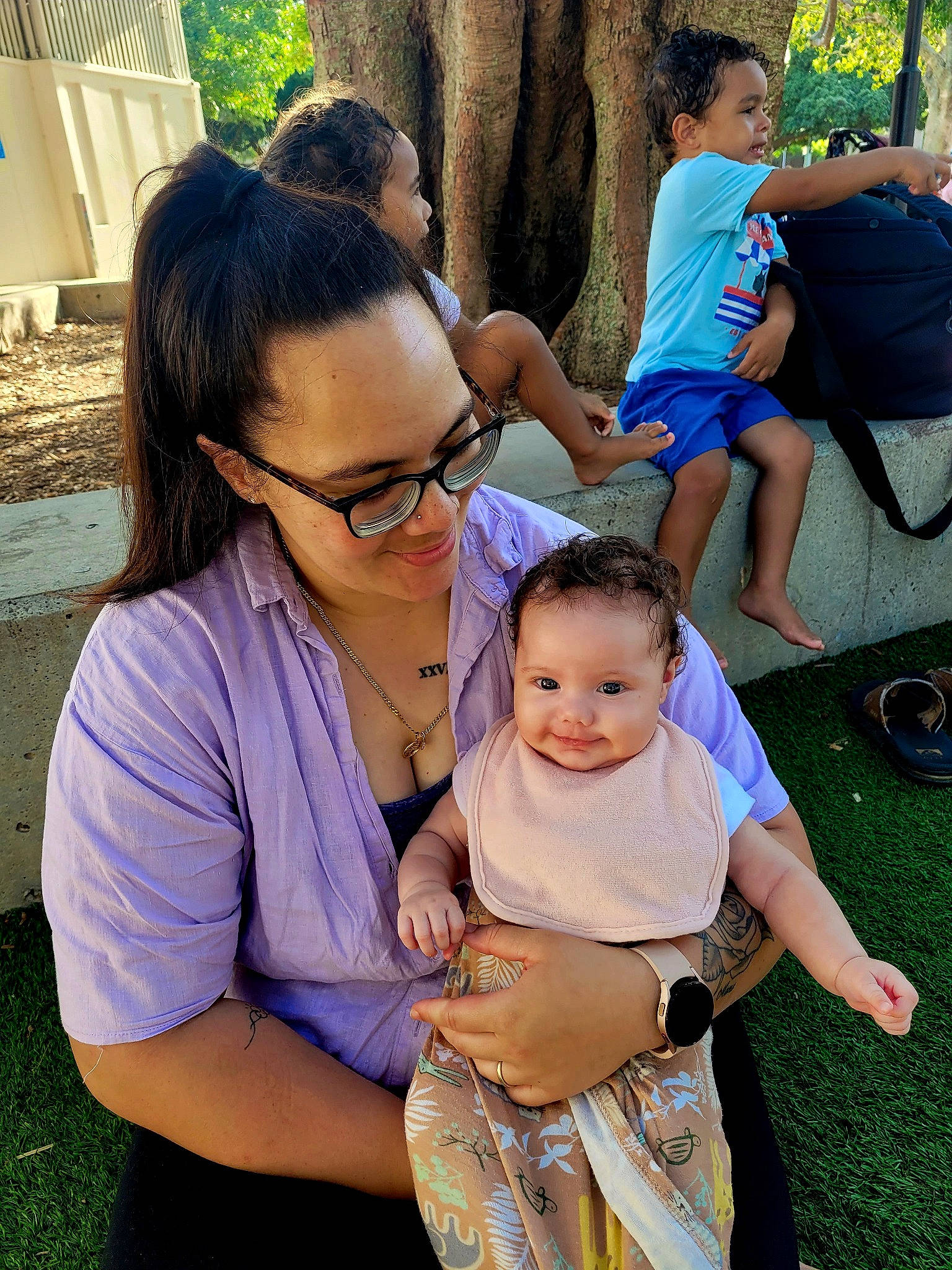 Kyriana joined the competition — help win amazing prizes! arm, cool, eyewear, facial_expression, fashion, grass, green, hair, hairstyle, hand, happy, interaction, leisure, person, plant, recreation, shorts, shoulder, style, summer