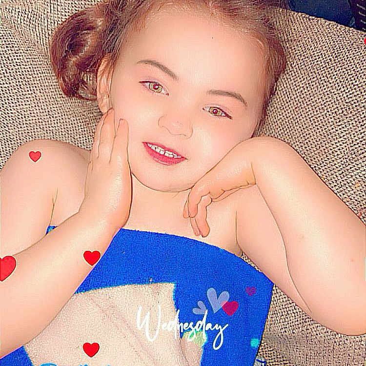 Remilyn is registered to the contest to win money with this photo: blanket, bodypart, child, clothing, couch, cushion, face, female, finger, furniture, girl, hand, happy, head, homedecor, laughing, person, photography, portrait, smile