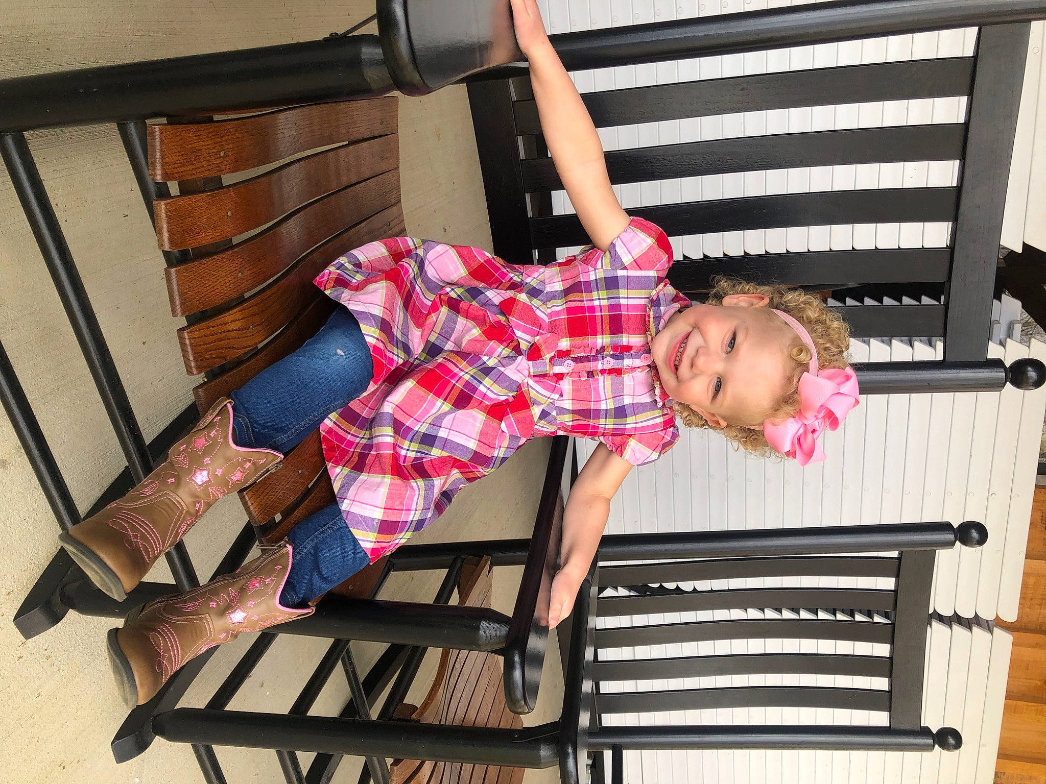 Symphony is registered to the contest to win money with this photo: arm, comfort, dress, fashion, furniture, human_leg, joint, joy, knee, leg, leisure, outdoor_furniture, pattern, person, plaid, shoe, sleeve, tartan, textile, thigh