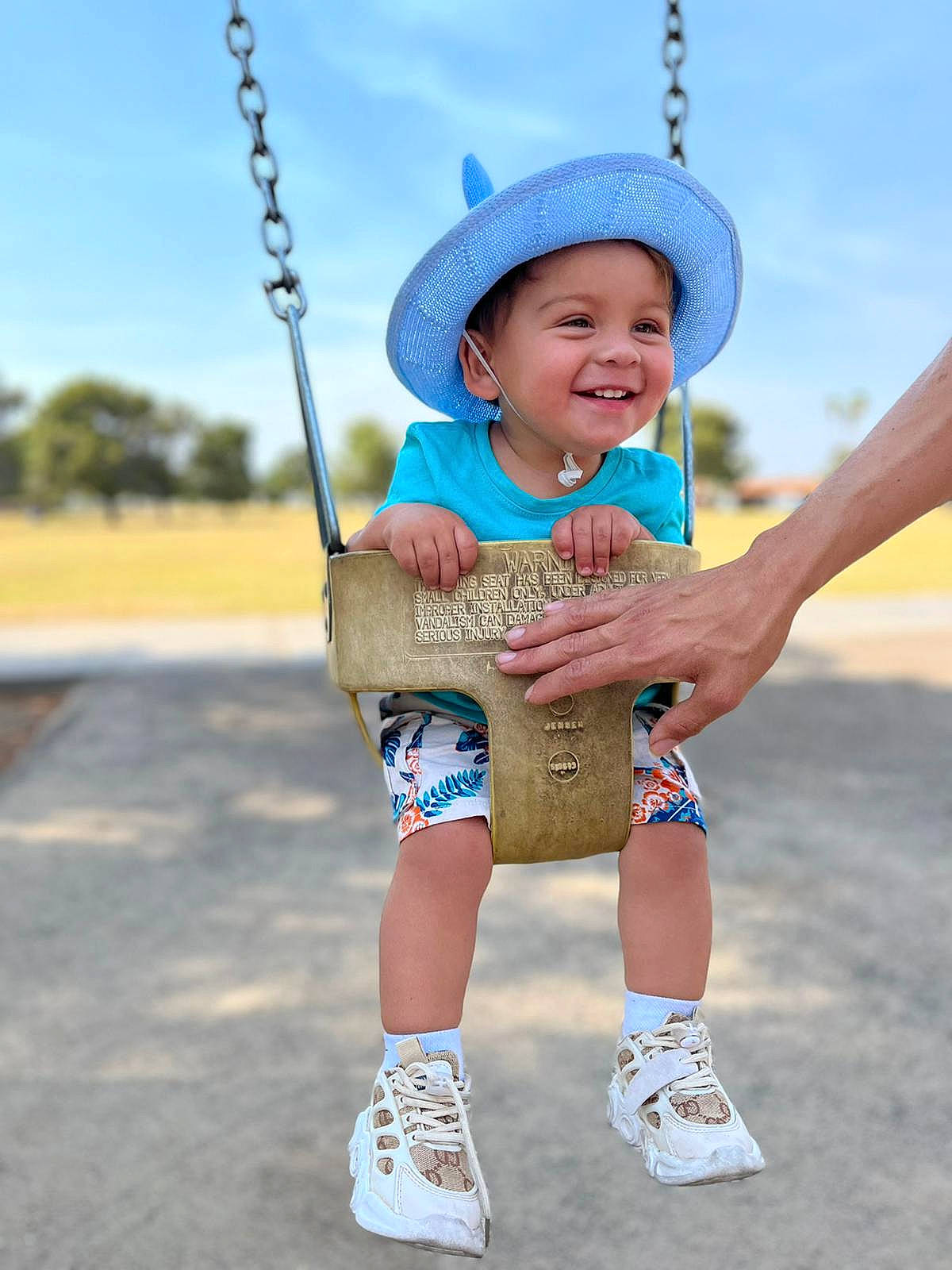 Zyan is registered to the contest to win money with this photo: arm, cloud, cool, finger, fun, grass, hand, happy, hat, headwear, human_body, joy, leisure, person, public_space, recreation, sky, smile, summer, t_shirt